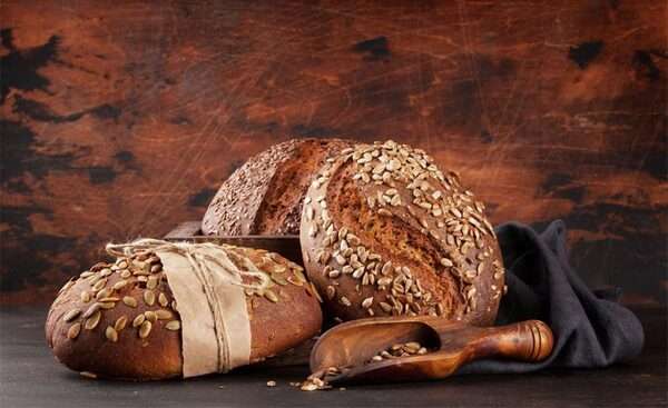 Freshly baked bread in a calm kitchen setting with warm natural light